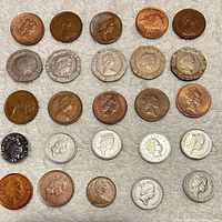 Fronts of 25 assorted UK coins arranged 5×5