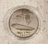 Reverse of coin showing Ferdinand von Zeppelin, airship and denomination