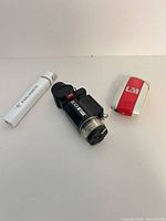 Front view of three lighters showing branding and colors