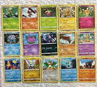 All 15 Pokémon cards laid out in three rows, full view