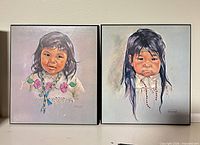 Both framed portrait prints side by side