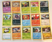Front view of all 15 Pokémon cards laid out in grid