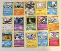 All 15 Pokémon cards laid out in three rows of five