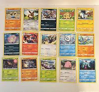 Front view showing all 15 Pokémon cards laid out in three rows of five