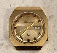 Front view of Bulova Accutron watch head showing dial and case