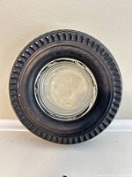 Front view showing glass insert and Firestone branding