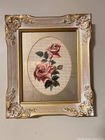 Front view of framed needlepoint roses