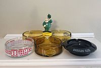 Front view showing all five ashtrays and key chain