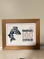 Front view of framed commemorative print showing artwork and text