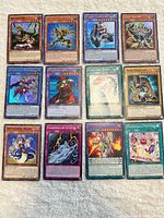 Full set of 12 cards laid out in three rows on white surface