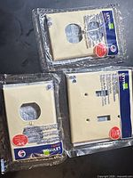 Front view showing all three sealed Leviton wall plates