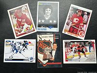 all six Doug Gilmour hockey cards laid out