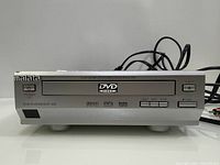 Front view showing brand, model, controls and disc tray