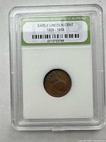 Front of INB slab showing obverse of Lincoln cent and certification label