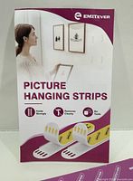 Front of retail display card showing product name and usage graphics