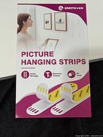 Front view of Emitever Picture Hanging Strips retail package