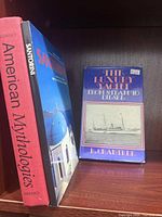 Front view of all three books on shelf