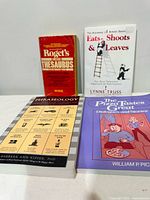 Front covers of all four books displayed