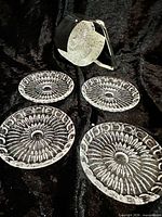 set of four coasters and ice bucket with glass inserts displayed