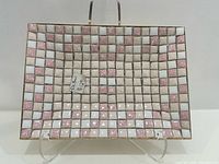 Top view showing mosaic tile pattern and overall shape