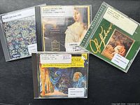 All four CD jewel cases front view