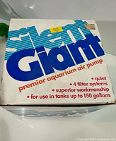 Top of Silent Giant box showing branding and tank capacity info