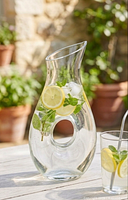 Carafe outdoors filled to illustrate size and design