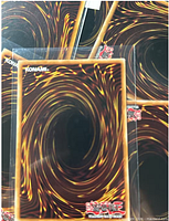 Stack of card backs showing multiple Konami Yu-Gi-Oh! cards