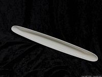 Full top view of white ceramic olive boat