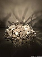 Lit twig wood centerpiece showing overall form and shadow pattern
