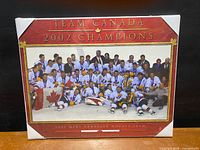 Front view of sealed Team Canada 2002 Champions 20 x 16 team photo