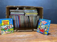 box of assorted Archie digest comics with two issues displayed