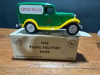Model van displayed on original box showing Lipton Tea Co. livery and 1932 Panel Delivery Bank text