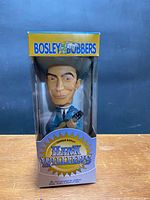 Front view of boxed Hank Williams Bosley Bobbers figure