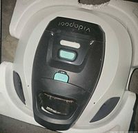 Top view of Vidapool robotic pool cleaner inside foam insert