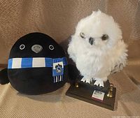 Front view of both plush toys showing overall appearance and detailing