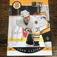 Front of 1990 Pro Set John Carter card showing autograph and player image
