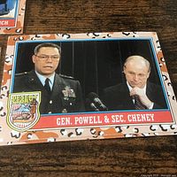 Card showing Gen. Powell & Sec. Cheney