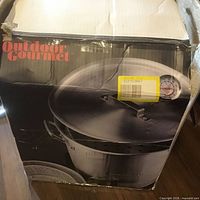 Box side showing Outdoor Gourmet branding