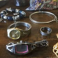 Overview of jewelry items on table