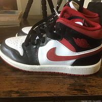 Left side view of pair showing colorway and condition