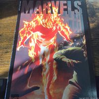 Front cover showing title MARVELS and Human Torch illustration