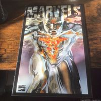 Front cover of one Marvels comic book showing silver figure with fiery chest