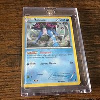 Front view of Suicune holographic card in hard case