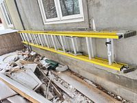 Full view of ladder along wall