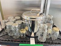 Overall view of stockpot and surrounding jars