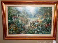Frontal close-up photo of the signed oil on canvas painting featuring a garden pathway and floral surroundings in a gold and white frame.
