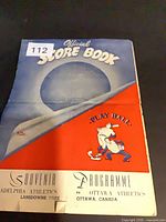 Front cover showing title, teams, venue information