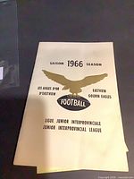 Front cover showing 1966 season, eagle logo and league name