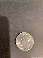 Reverse view of Eisenhower Bicentennial dollar showing Liberty Bell and Moon design